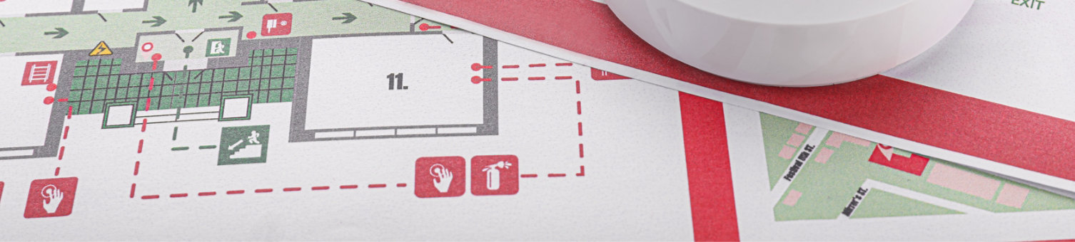 Smoke dectector on top of evacuation plans