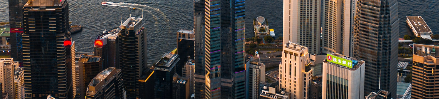Aerial view of the city centre of Hong Kong during daytime on a sunny day