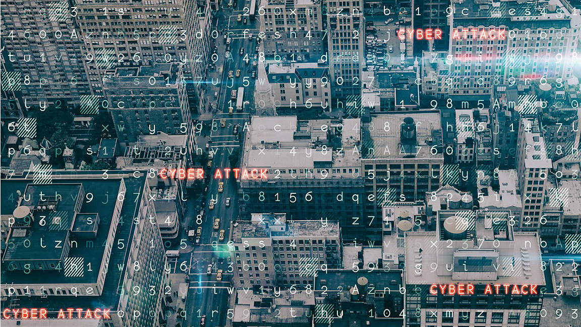 Aerial view of New York City with a text overlay indicating a cyber attack