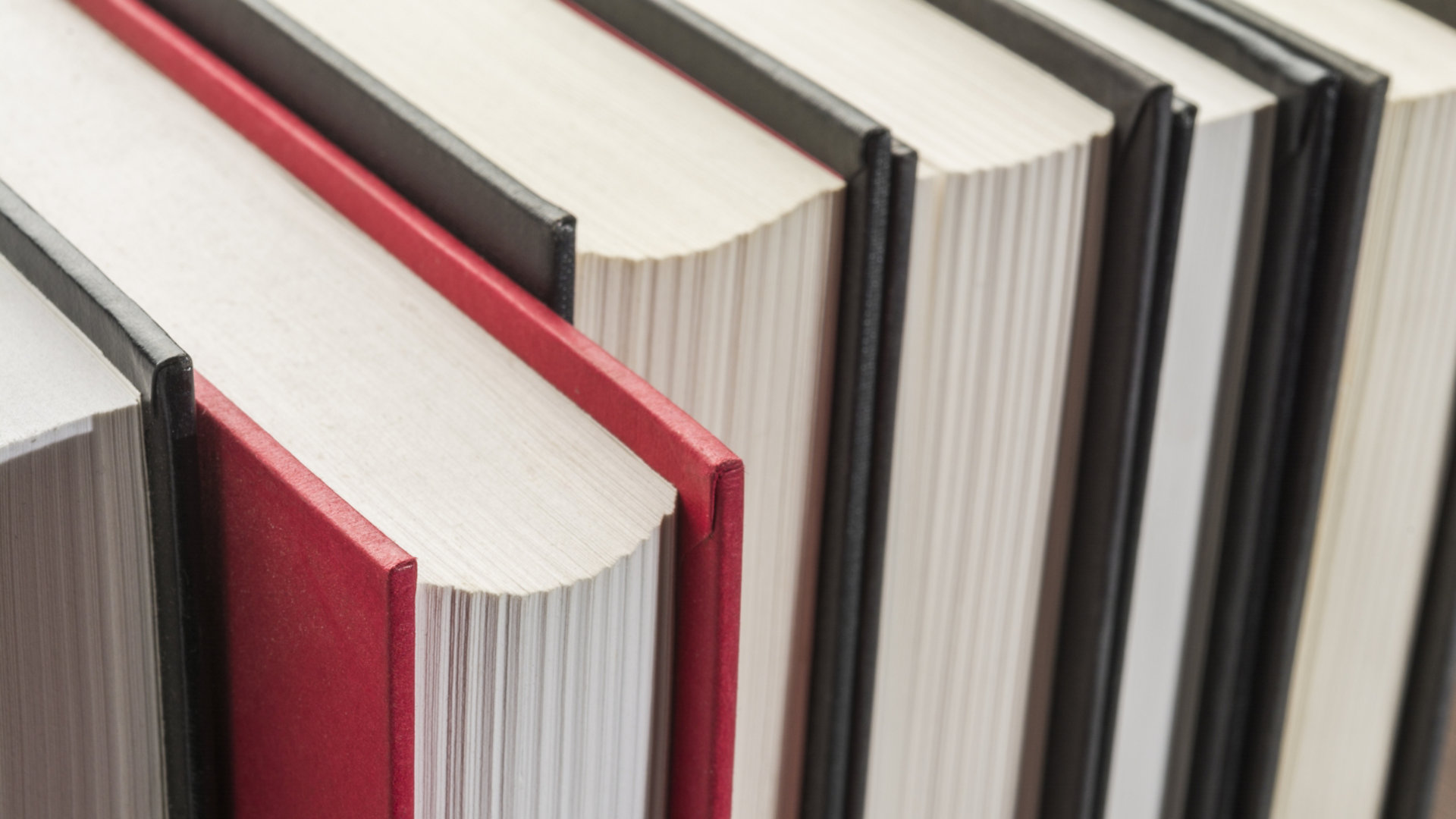 Red book on a book shelf