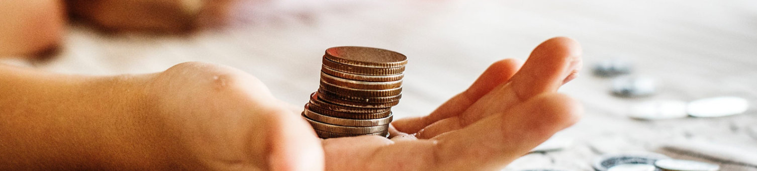 Coins being counted out on a table