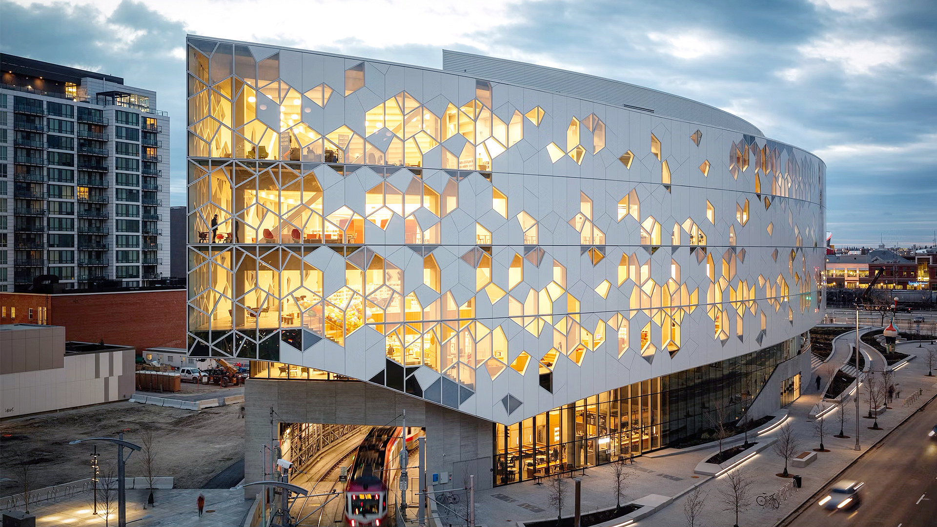 Calgary Central Library with view of train going underneath