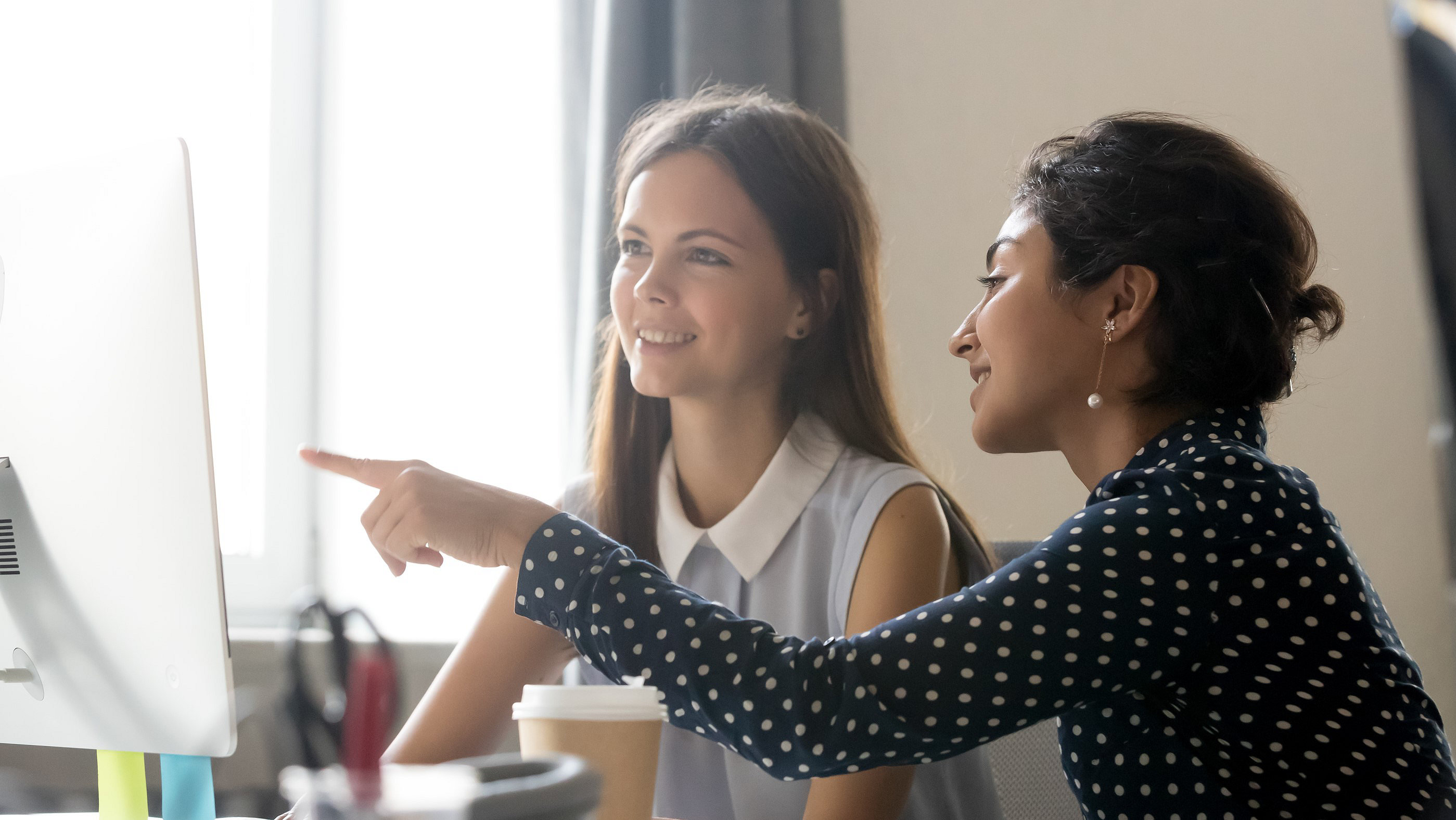 Two women at work