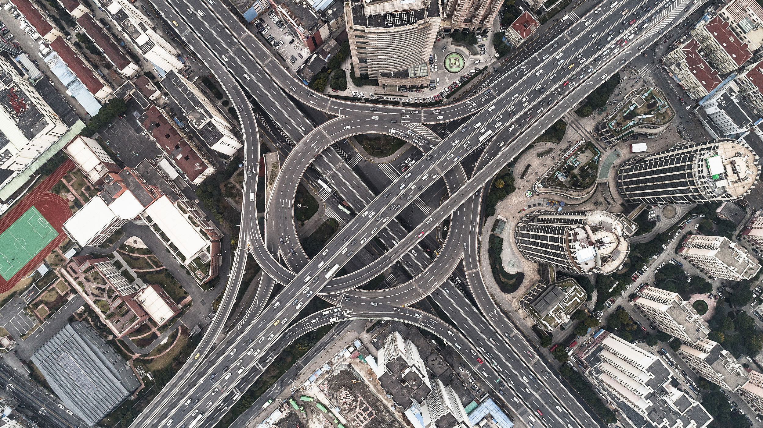 Aerial photo of a busy roundabout with multiple offramps