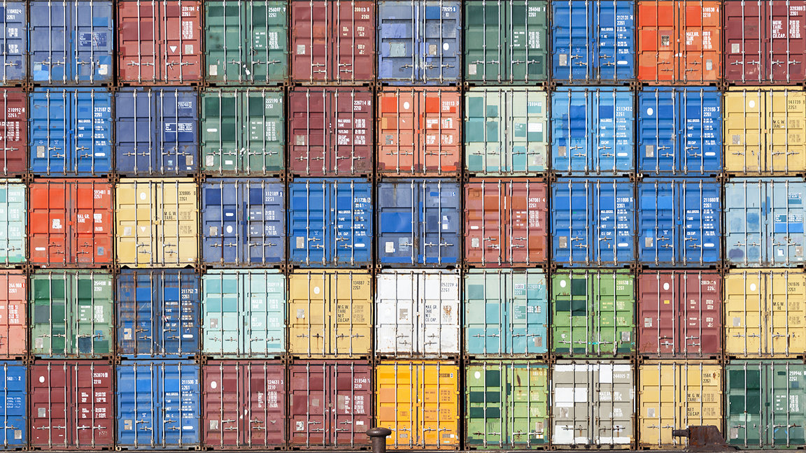 Picture of shipping containers stacked on top of each other