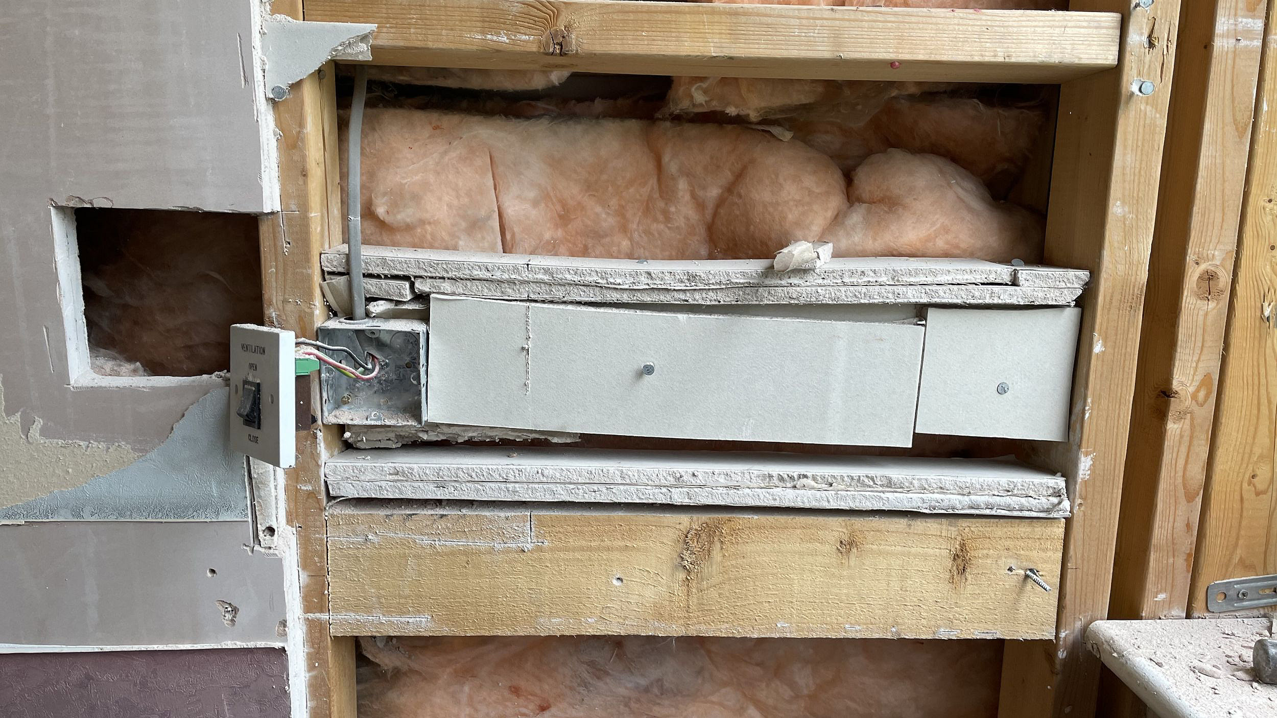 Why are firestopping defects so common in existing buildings?