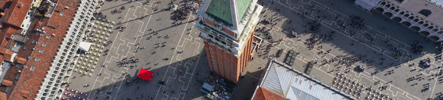 Aerial drone panoramic photo of iconic and unique Campanile in Saint Mark's square or Piazza San Marco, Venice, Italy; Shutterstock ID 1381412771; purchase_order: N/A; job: WBEF Europe Event; client: RICS_PP; other: 