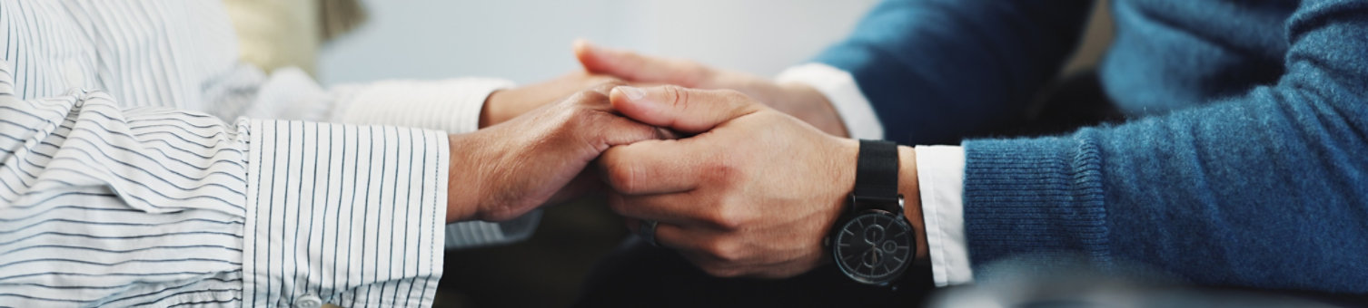 Psychology, support or patient holding hands with therapist for client empathy or sympathy. Therapy, trust or person with depression or mental health expert in counselling session for advice or help