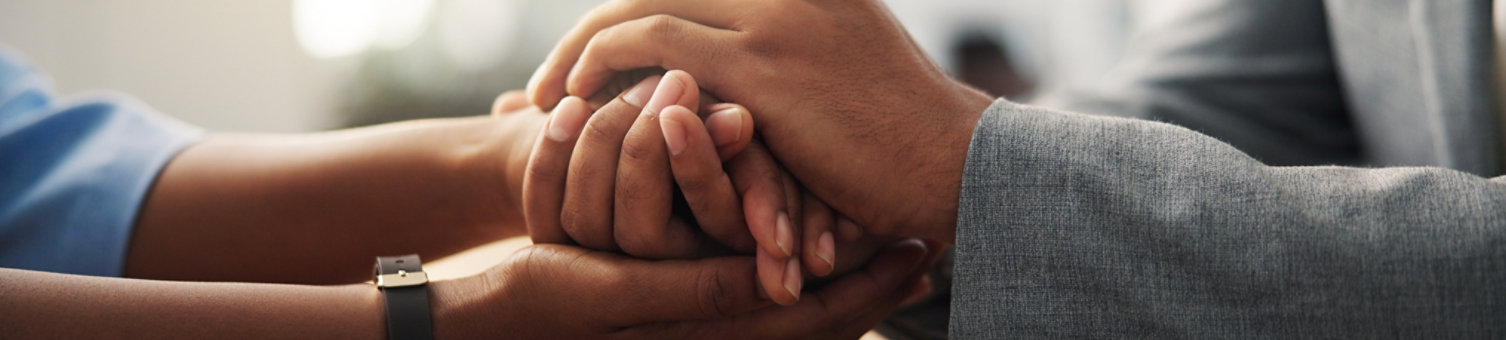 Corporate, people and holding hands for comfort in office with support, reassurance and empathy. Employees, consoling and understanding with partnership, stress management and disciplinary action