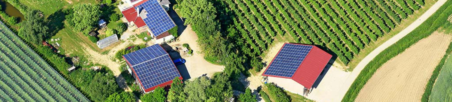 solar panels on the roofs of rural houses in Germany