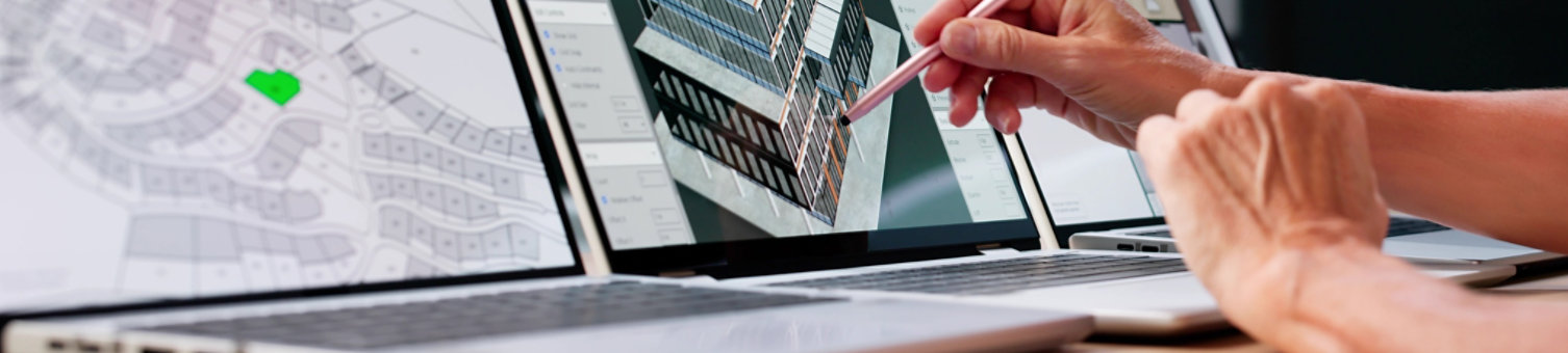 Hands designing on screen
