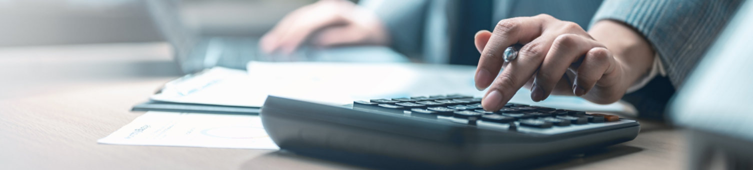 calculator, budget, tax, accounting, planning, cost, invoice, salary, Close-up of business person using calculator for accounting and budget planning, symbolizing finance, audit, and cost control.