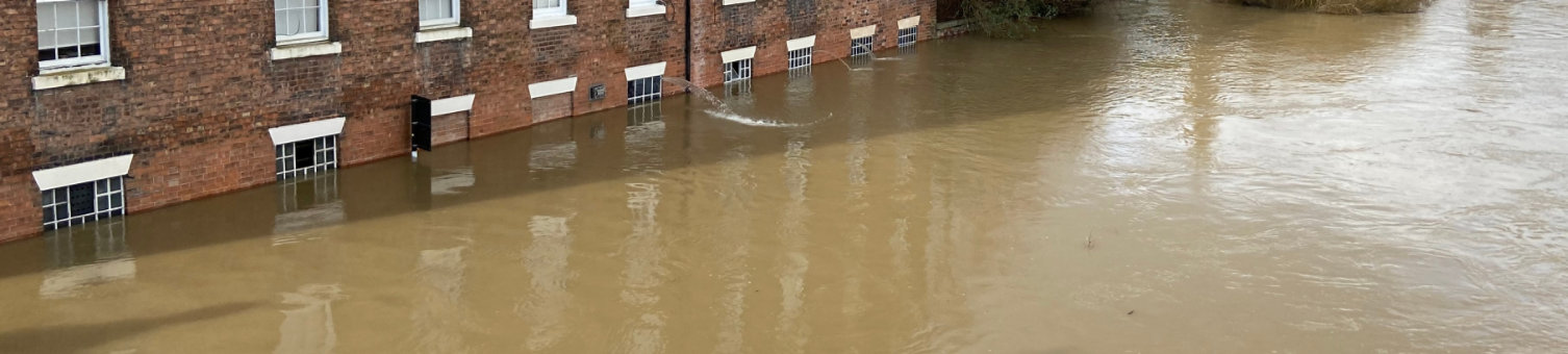 Flooded building on River Severn flooding in Shrewsbury, Shropshire, UK