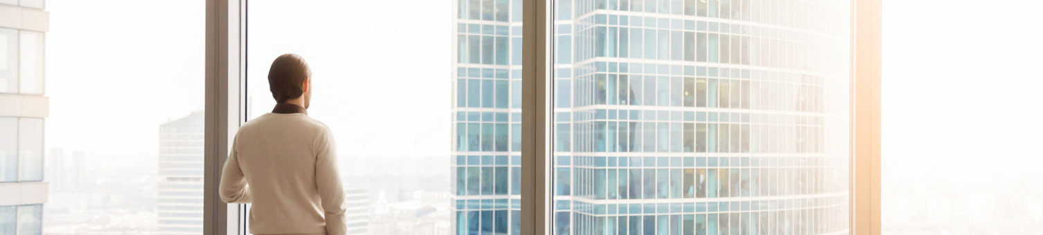 Horizontal photo rear back successful businessman look through window at big city, rest has break, think about future business vision concept, banner for website header design with copy space for text