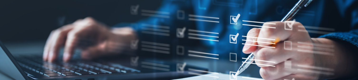 A person writing on a notepad