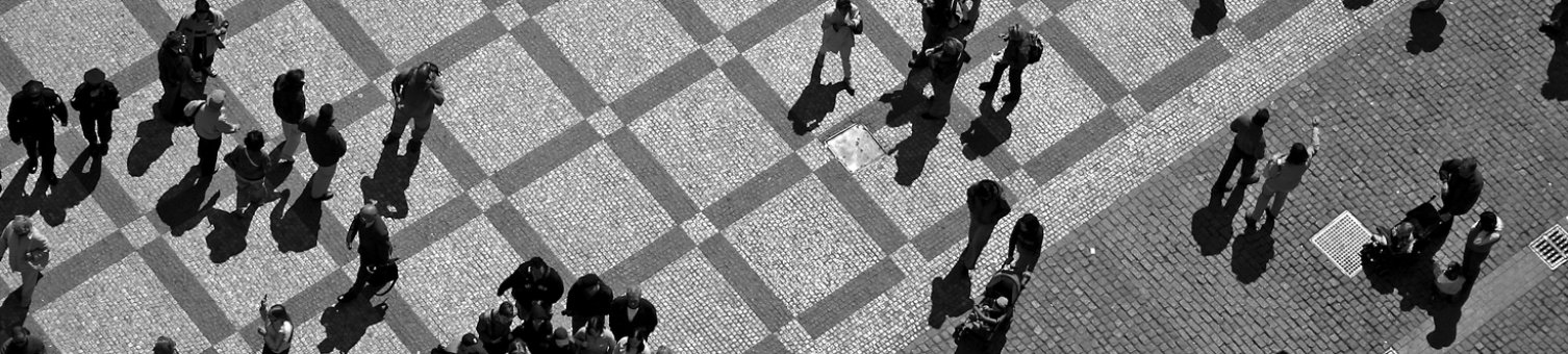 Groups of people gathering together in public