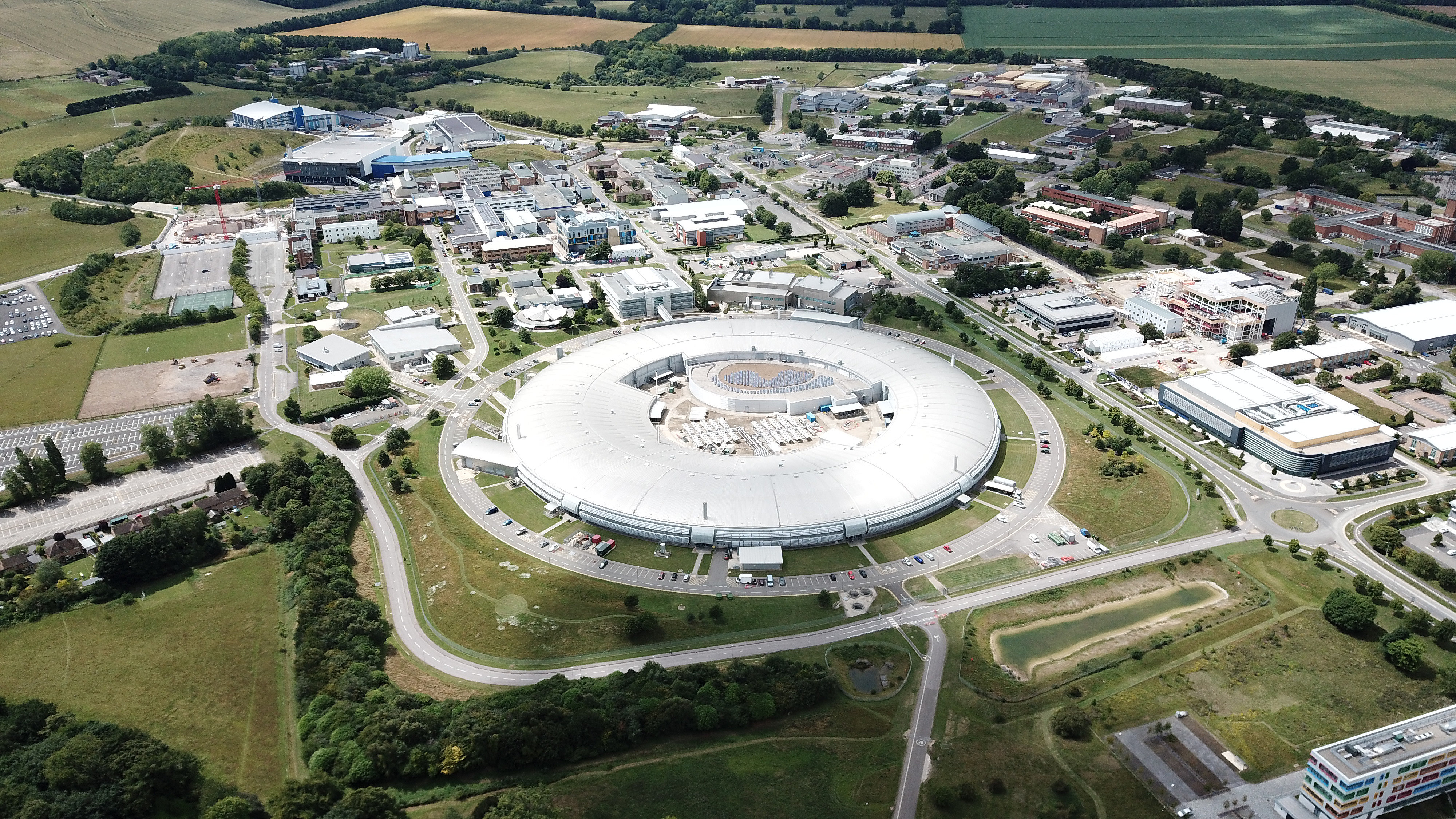 Harwell Campus viewed from the air, with large circular building visible at centre