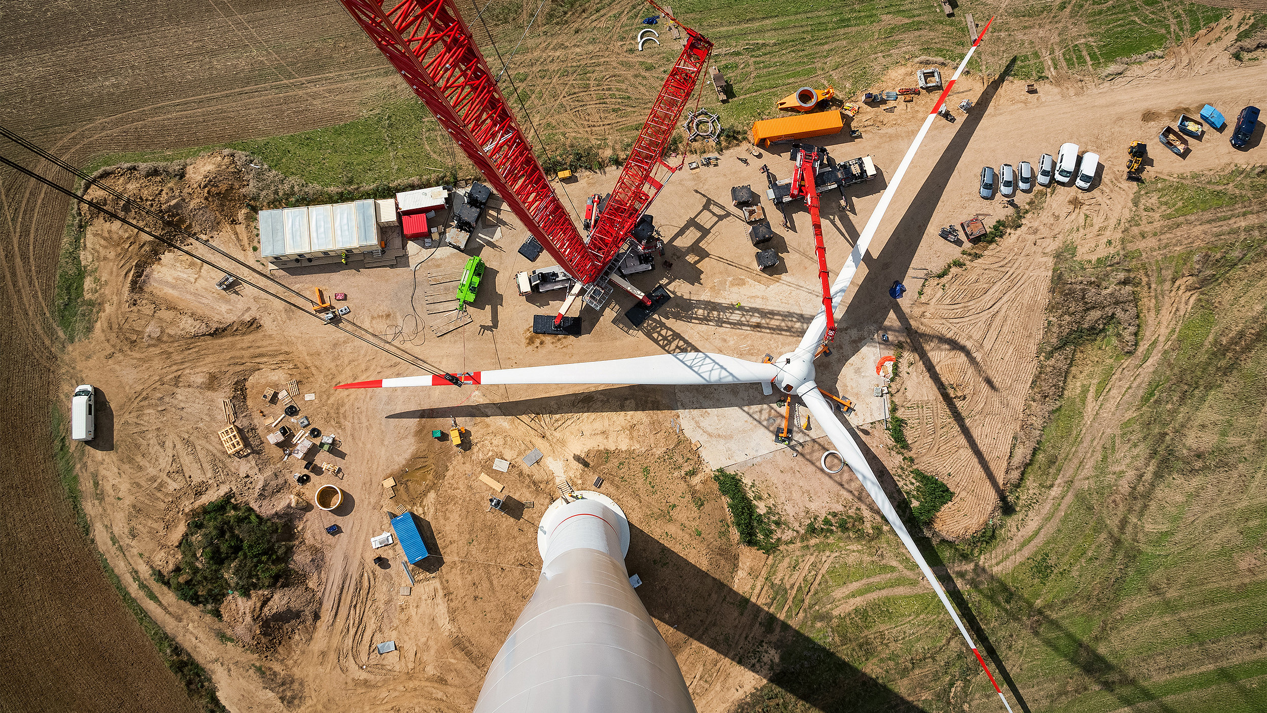 Rotor blades of a wind turbine ready to be assembled, aerial view