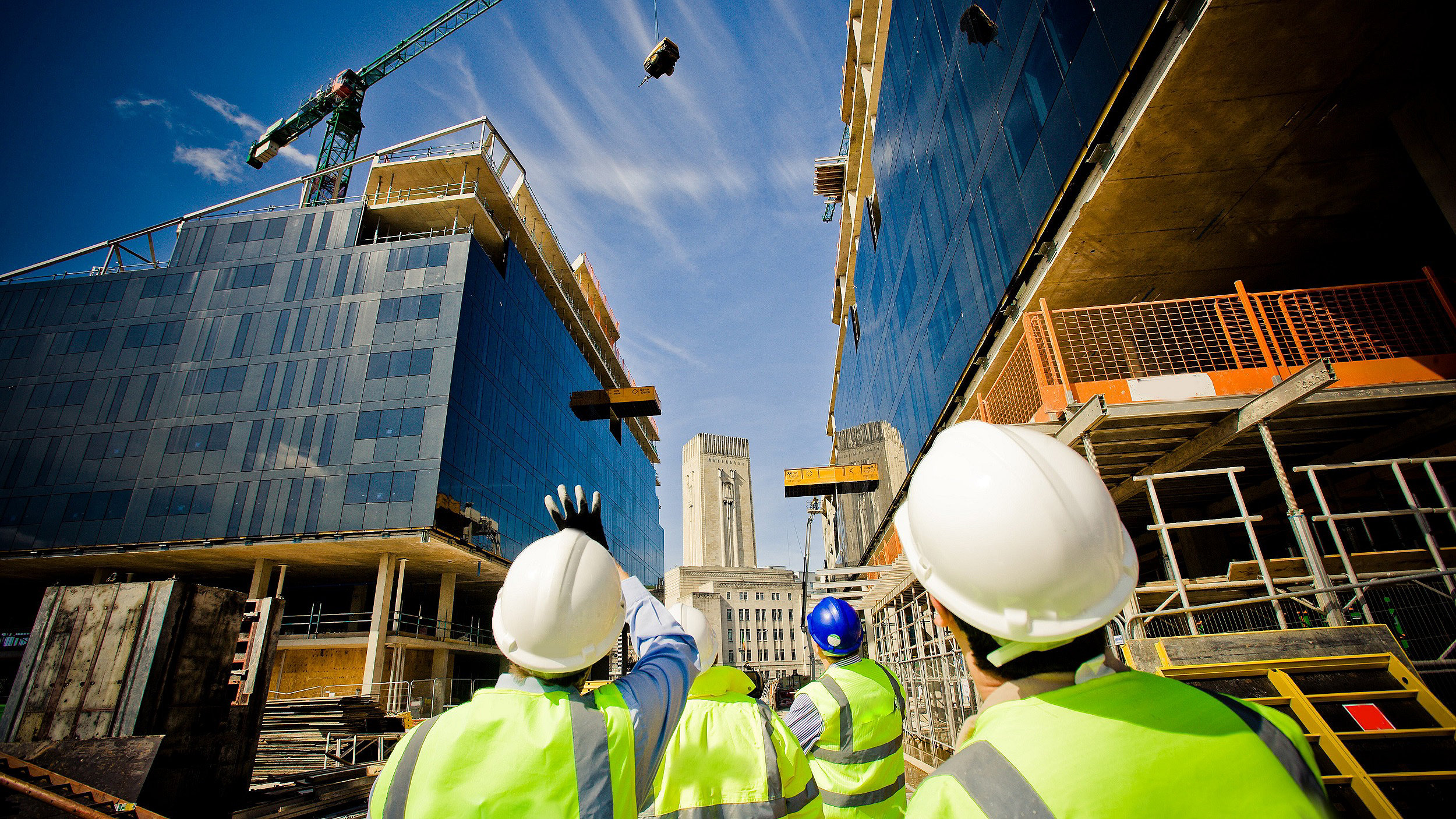 Four men on construction site