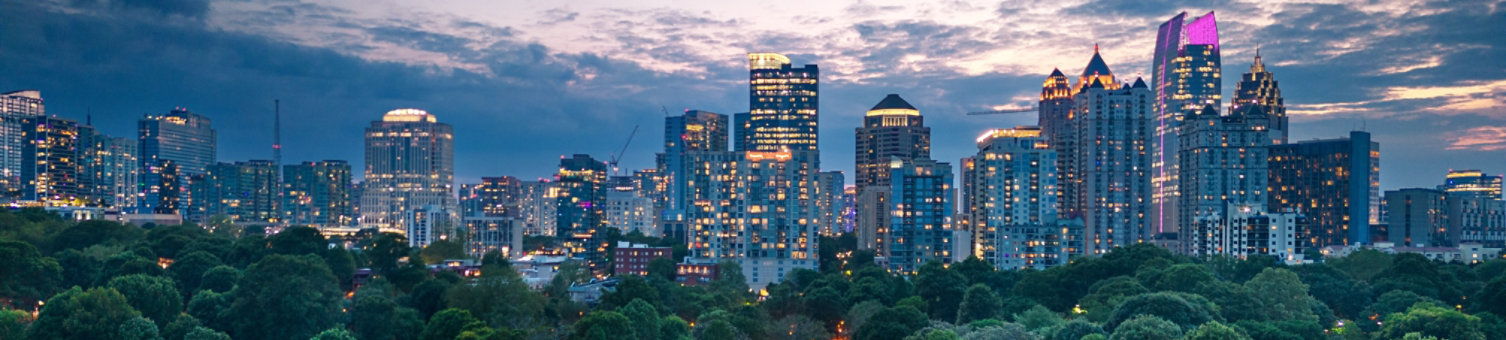 Atlanta, Georgia, USA overlooking Piedmont Park at dusk.