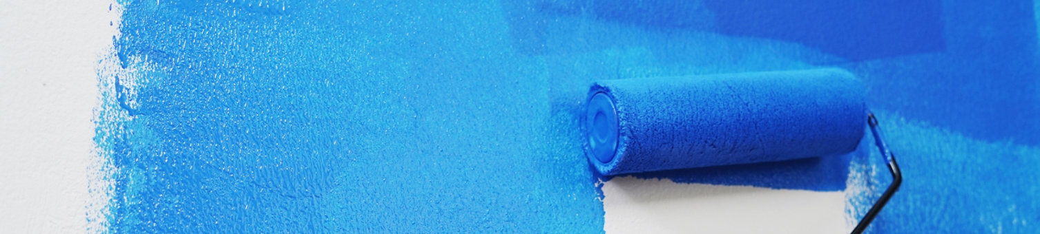 Paint roller painting wall blue
