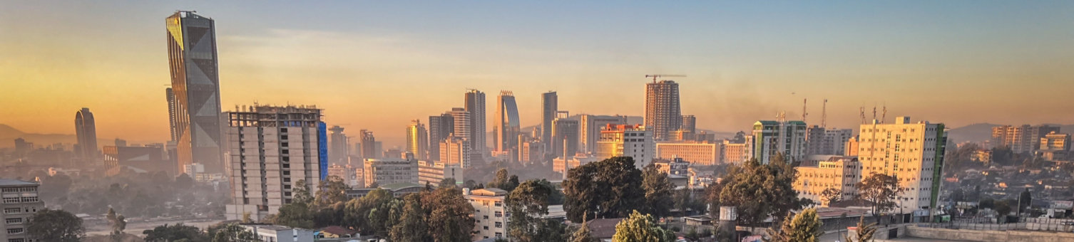 Aerial overview of Addis Abeba city, the capital of Ethiopia, showing brand new buildings and construction in the foreground, city centre and suburbs, Ethiopia