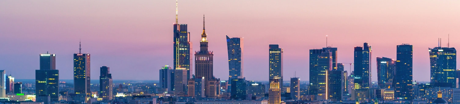 Evening aerial panorama of Warsaw city center, Vistula river and Swietokrzyski bridge