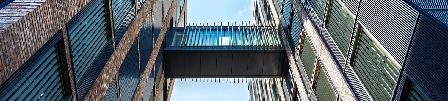 Two tall interconnected buildings
