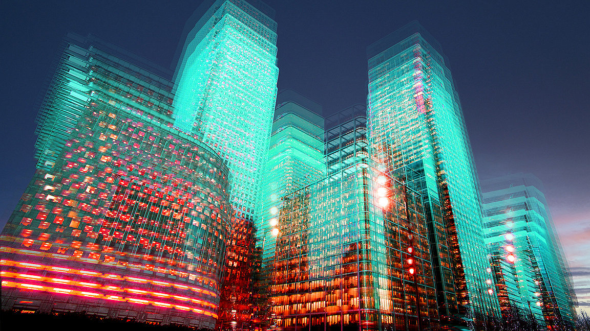 Office buildings lit up at night to create a virtual effect 