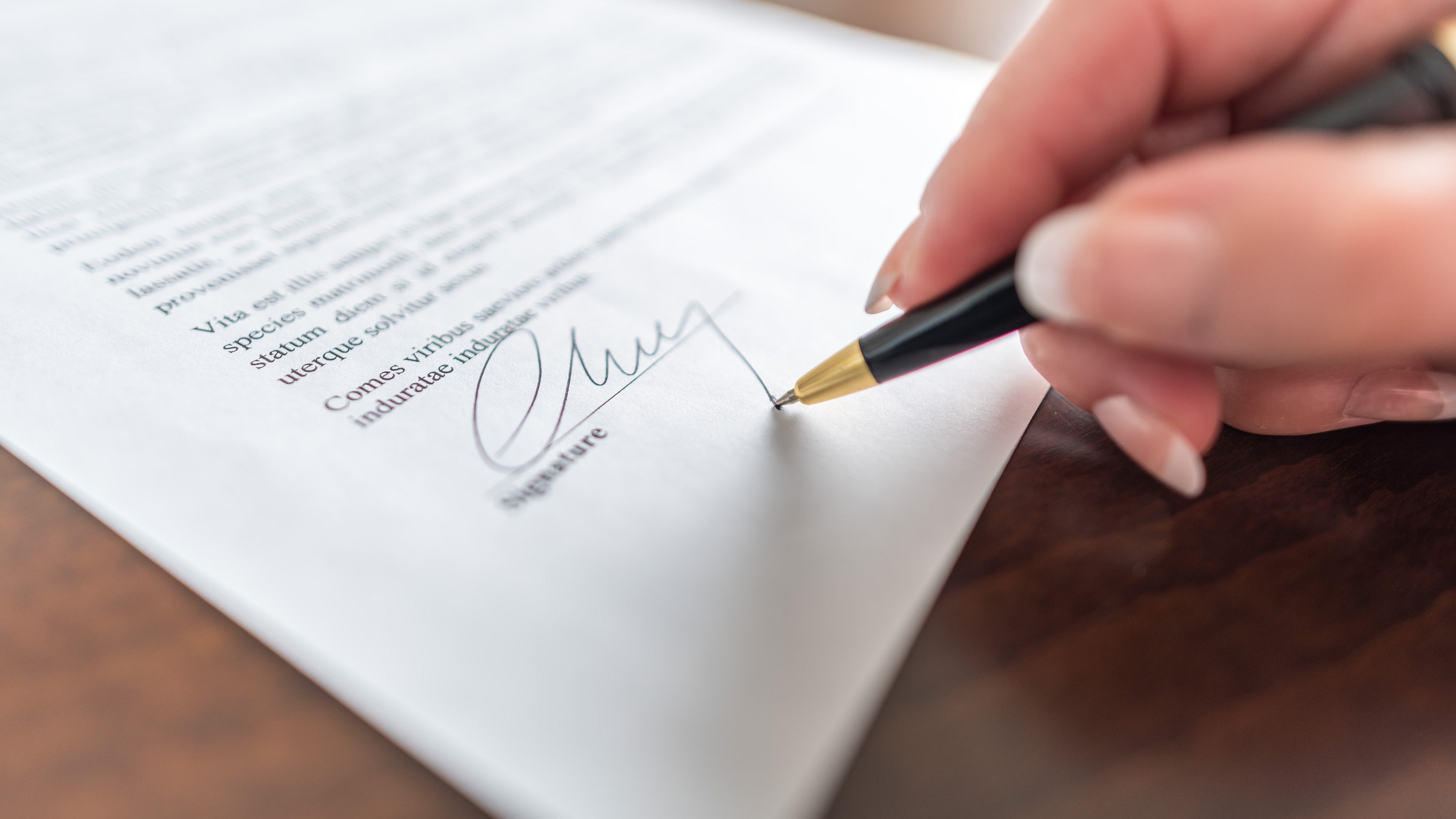 Woman signing contract