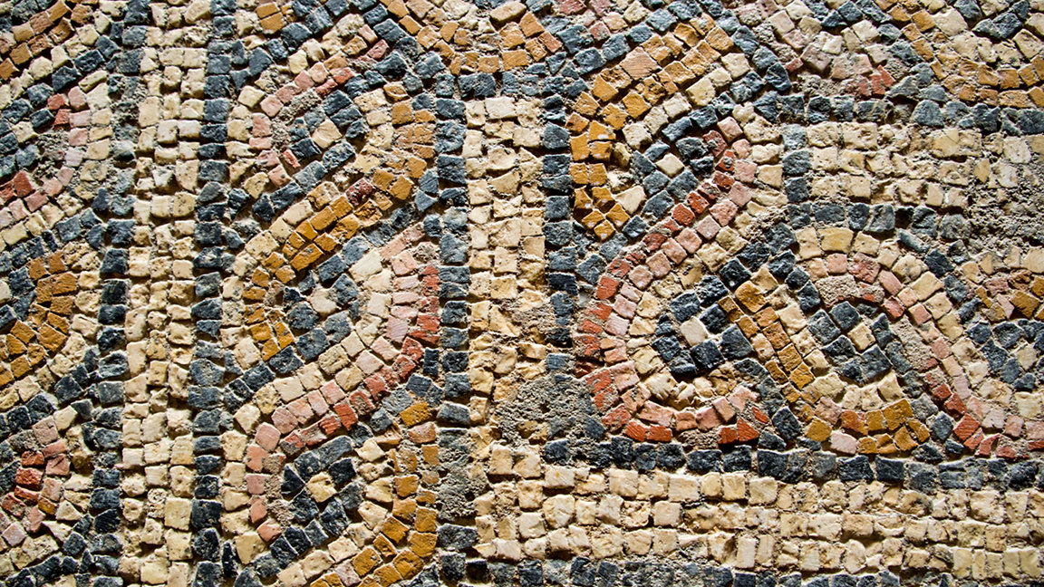 Close up of a Roman mosaic with twisting patterns