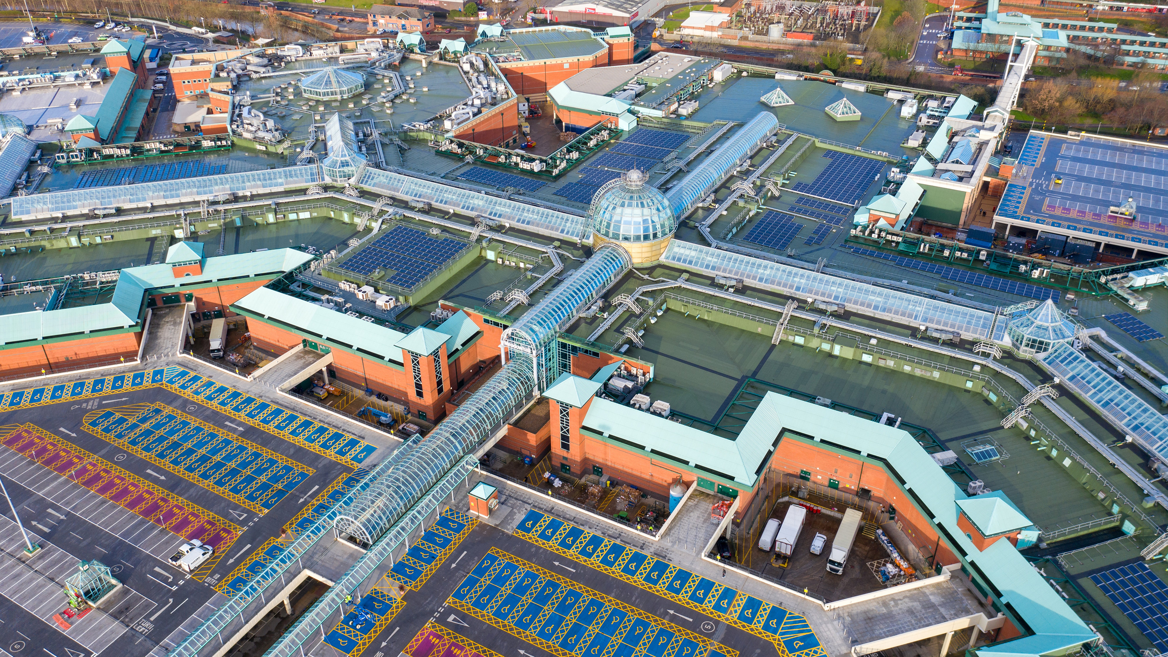 Shopping centre and carpark viewed from above