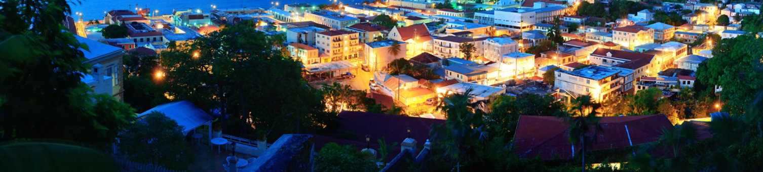 City at night time on the coast