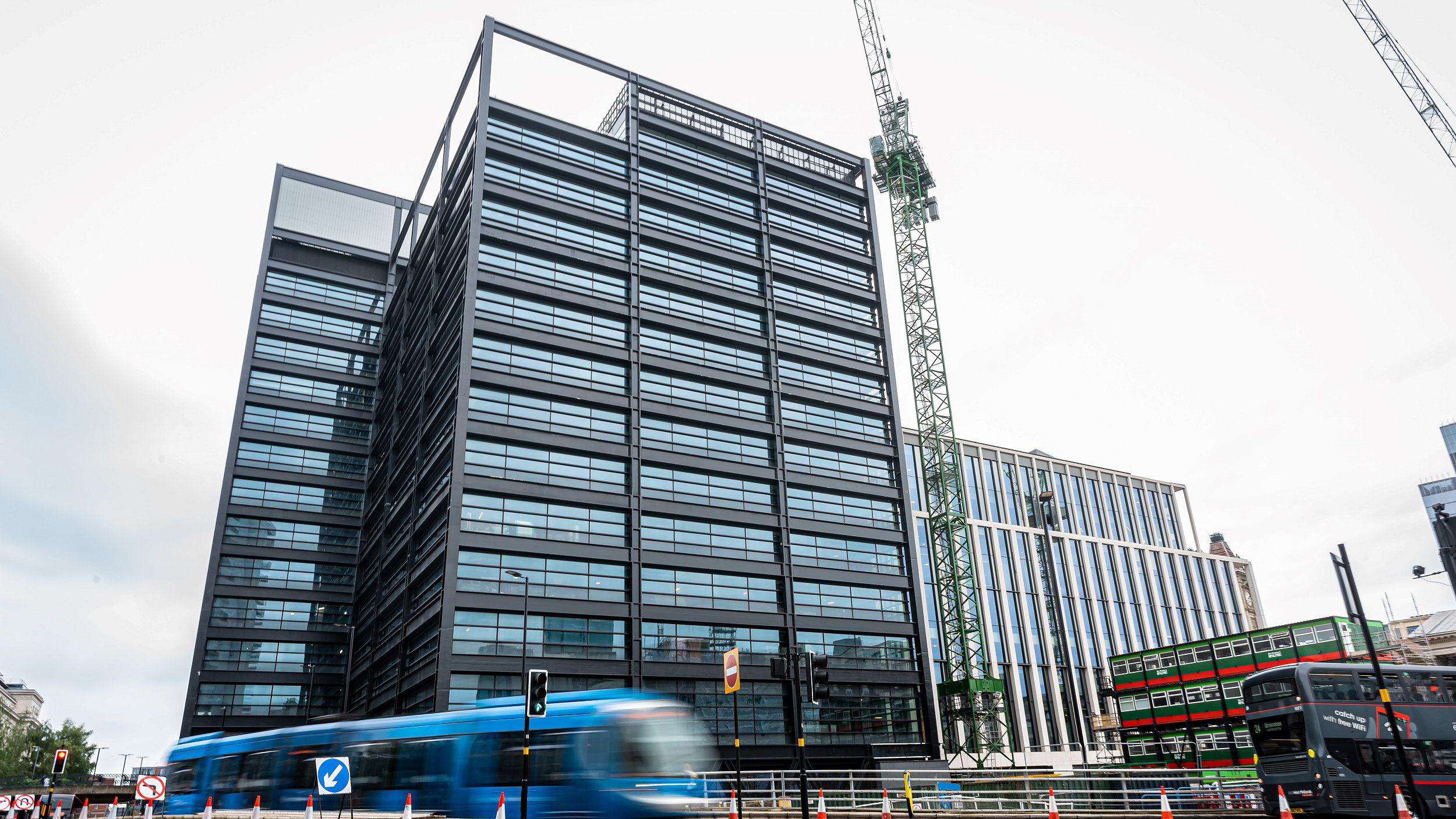 Photo of One Centenary Way from the street outside, tram passing by