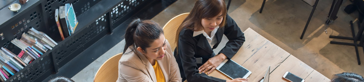 Overhead shot of business contract being agreed