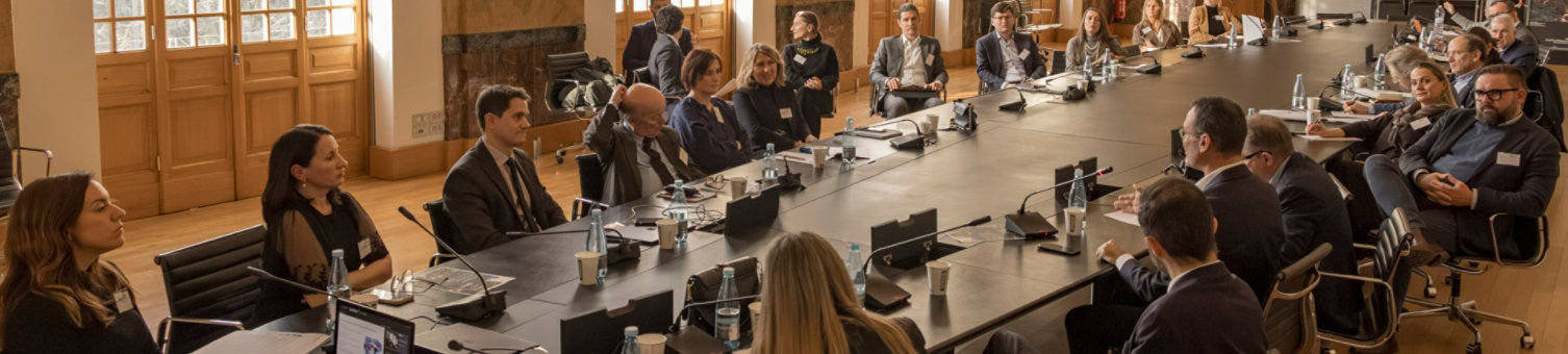 Attendees at a long table during the RICS European Education Forum 2026
