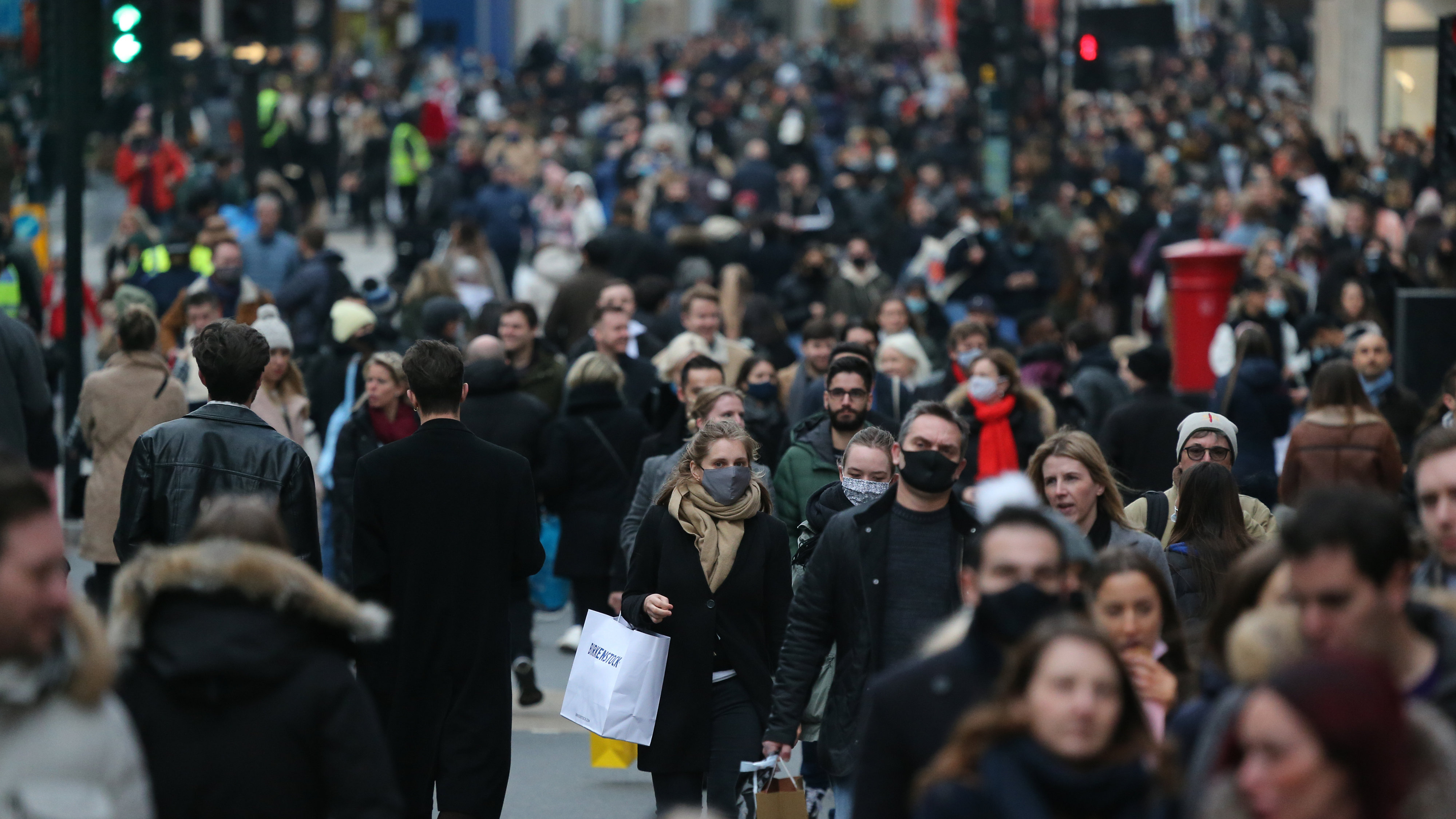 Shoppers wearing masks on Oxford Street, London