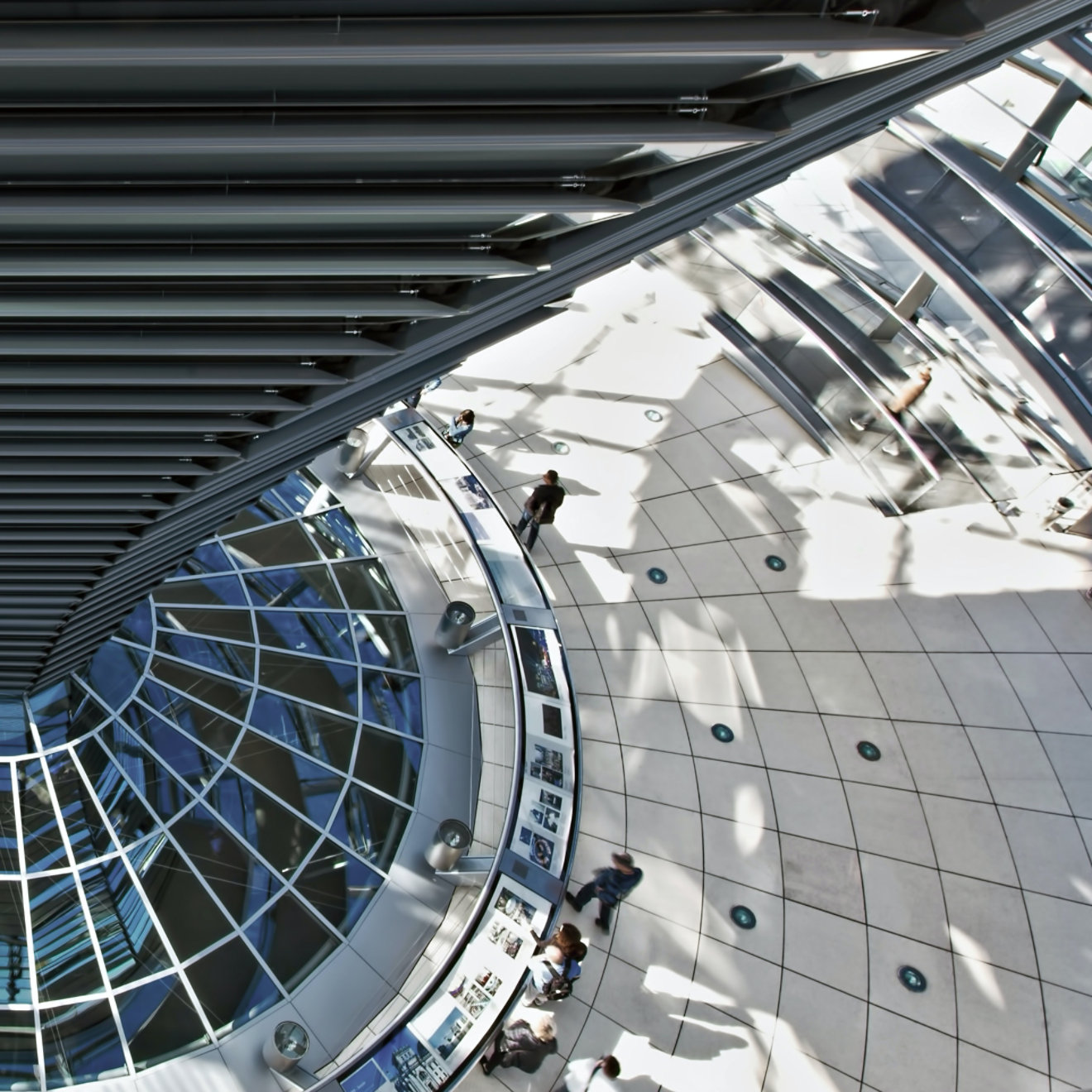 People inside a glass atrium