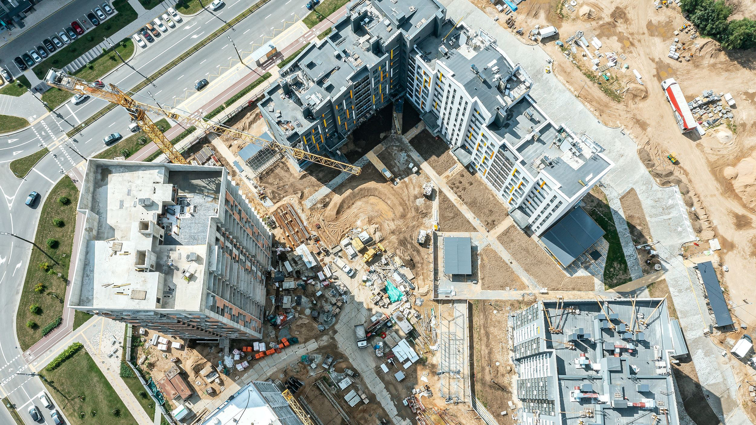 Overhead photo of residential tower blocks under construction