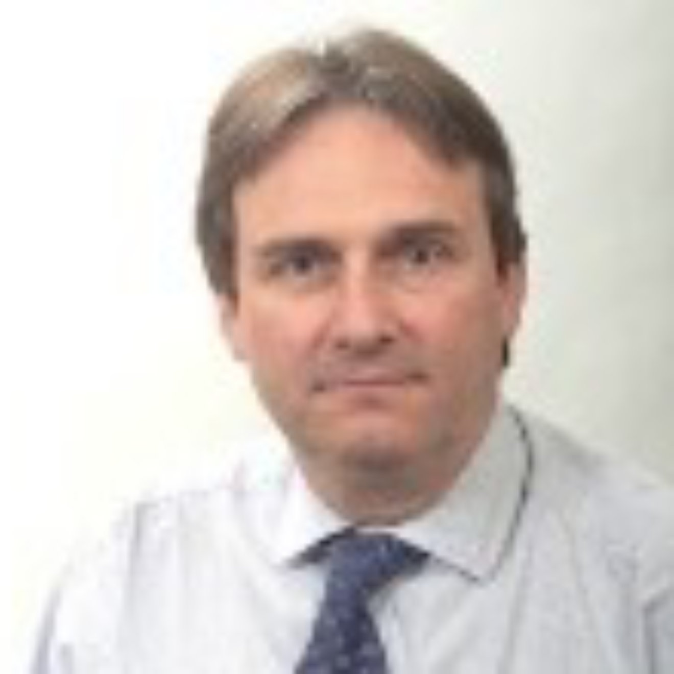 Headshot of Professor Michael Parrett.
