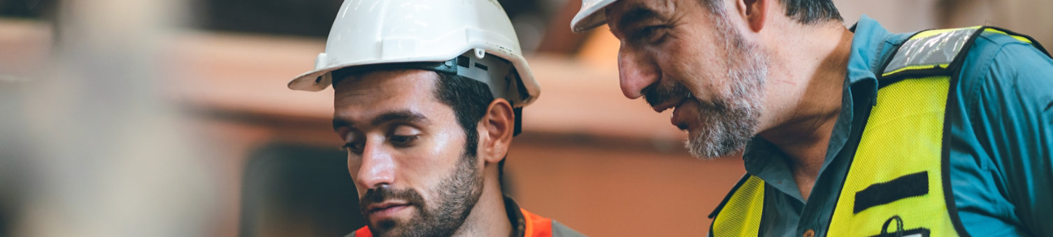 Two construction workers in PPE