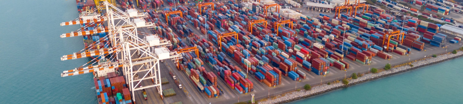 Cargo dock with containers and a ship