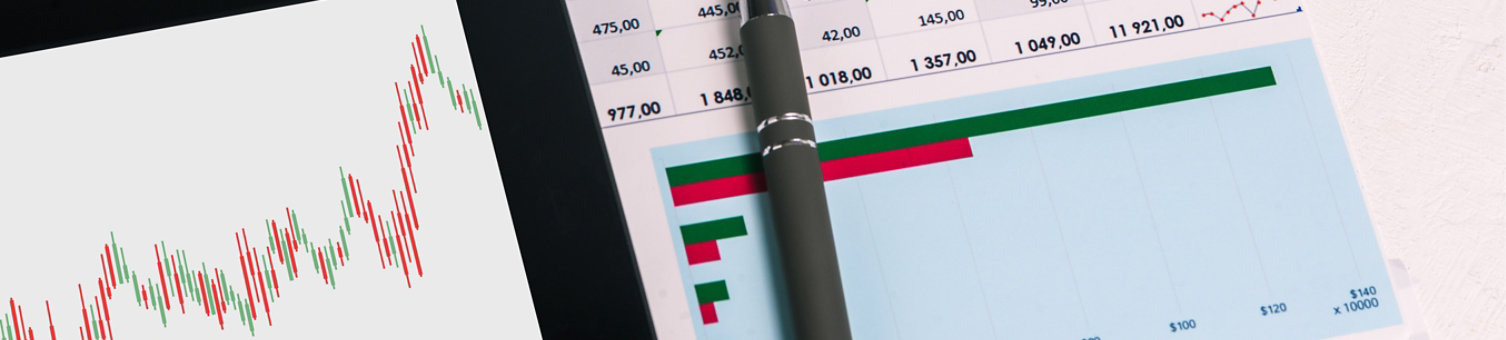 Desktop with documents, tablet and charts. Analytics of the company's activities. Budget planning, audit and tax calculation. The concept of issuing a loan and calculating salaries. Stock market.