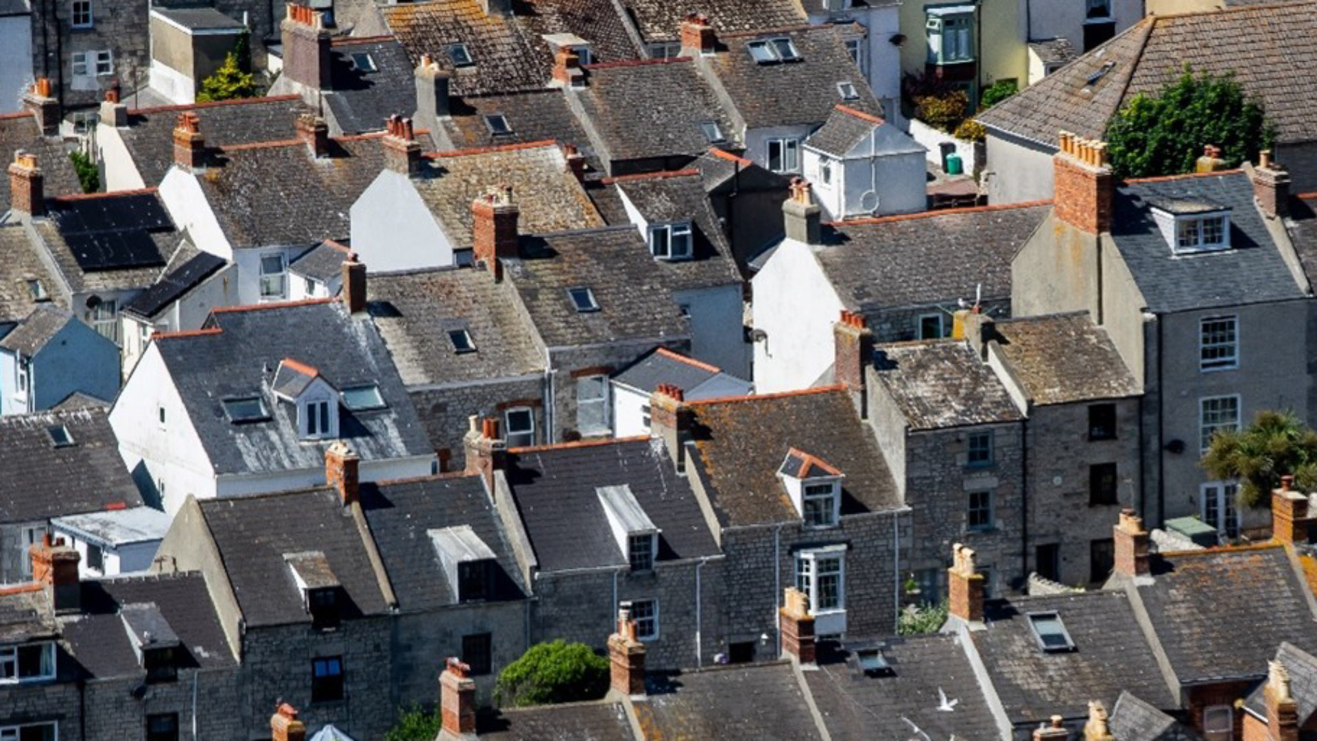 Rooftops of rows of residential housing 