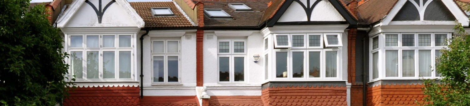 A row of retrofit houses on a street