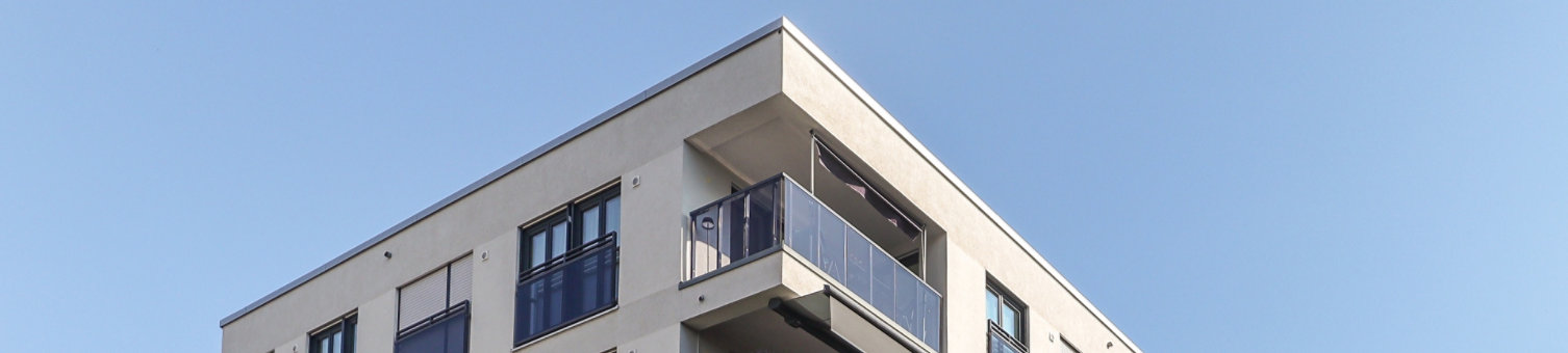 Apartment block with grass