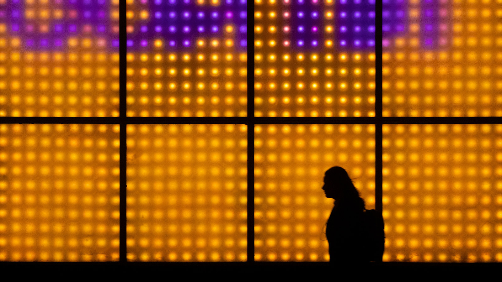 Womans silhouette at night