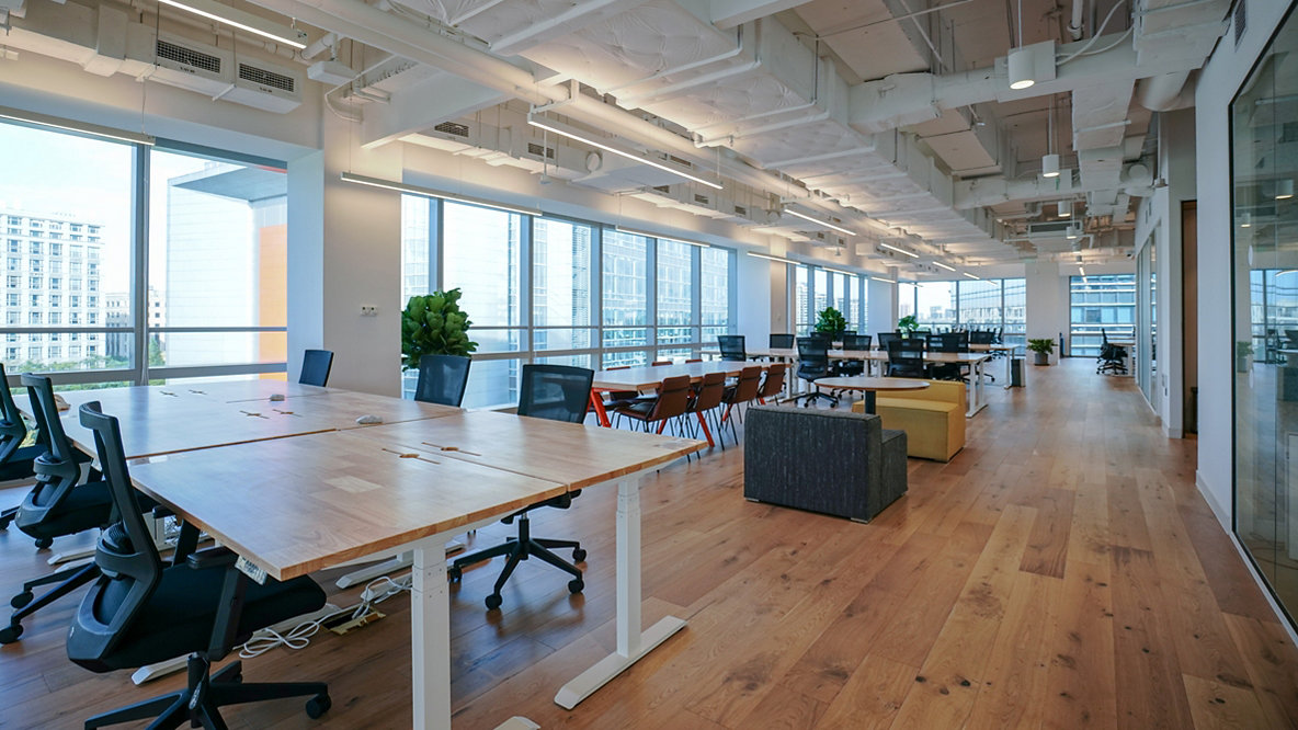How do office layouts affect workplace culture?