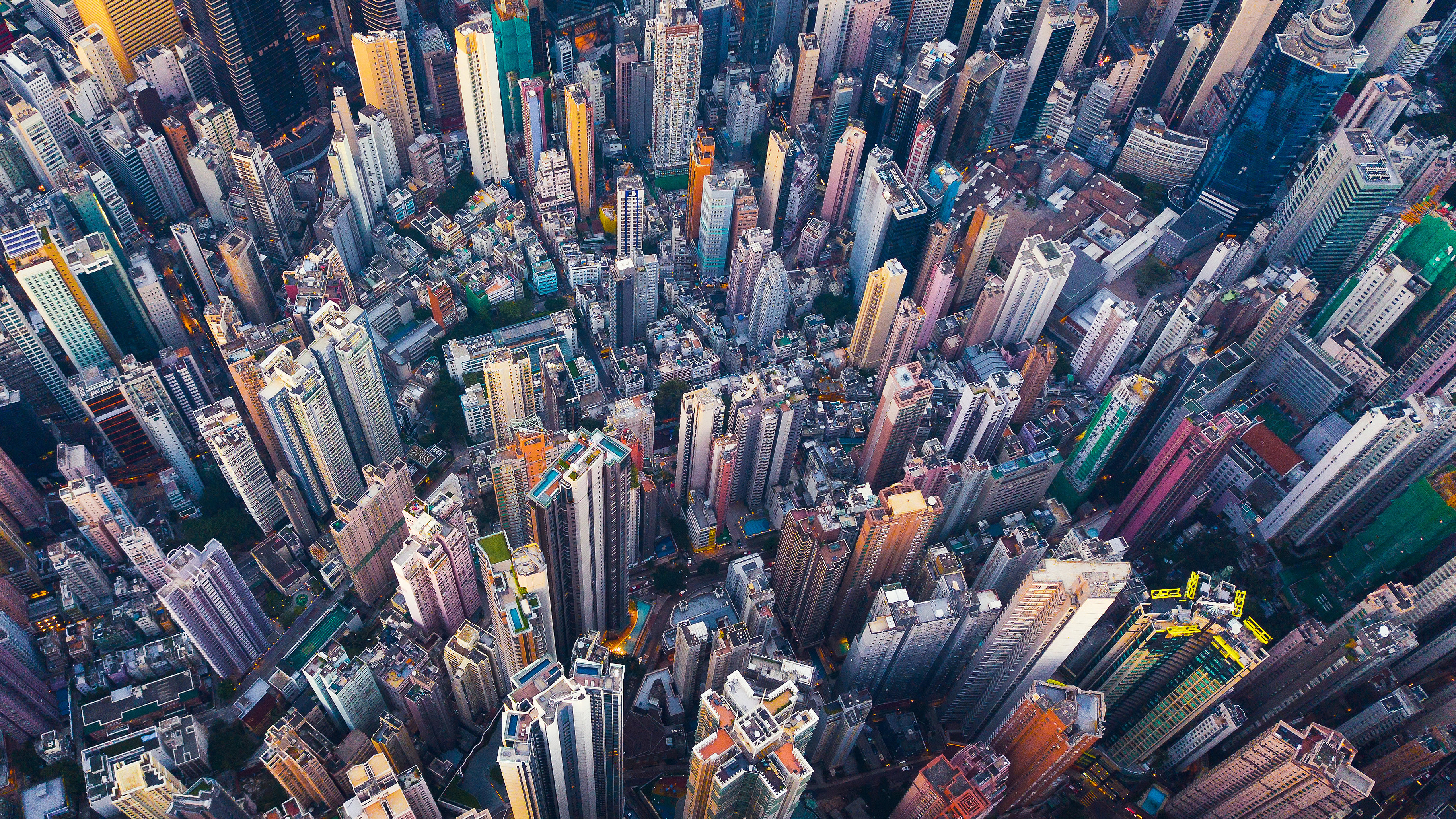 Aerial view of Hong Kong Downtown. Financial district and business centers in smart city in Asia. Top view of skyscraper and high-rise buildings.