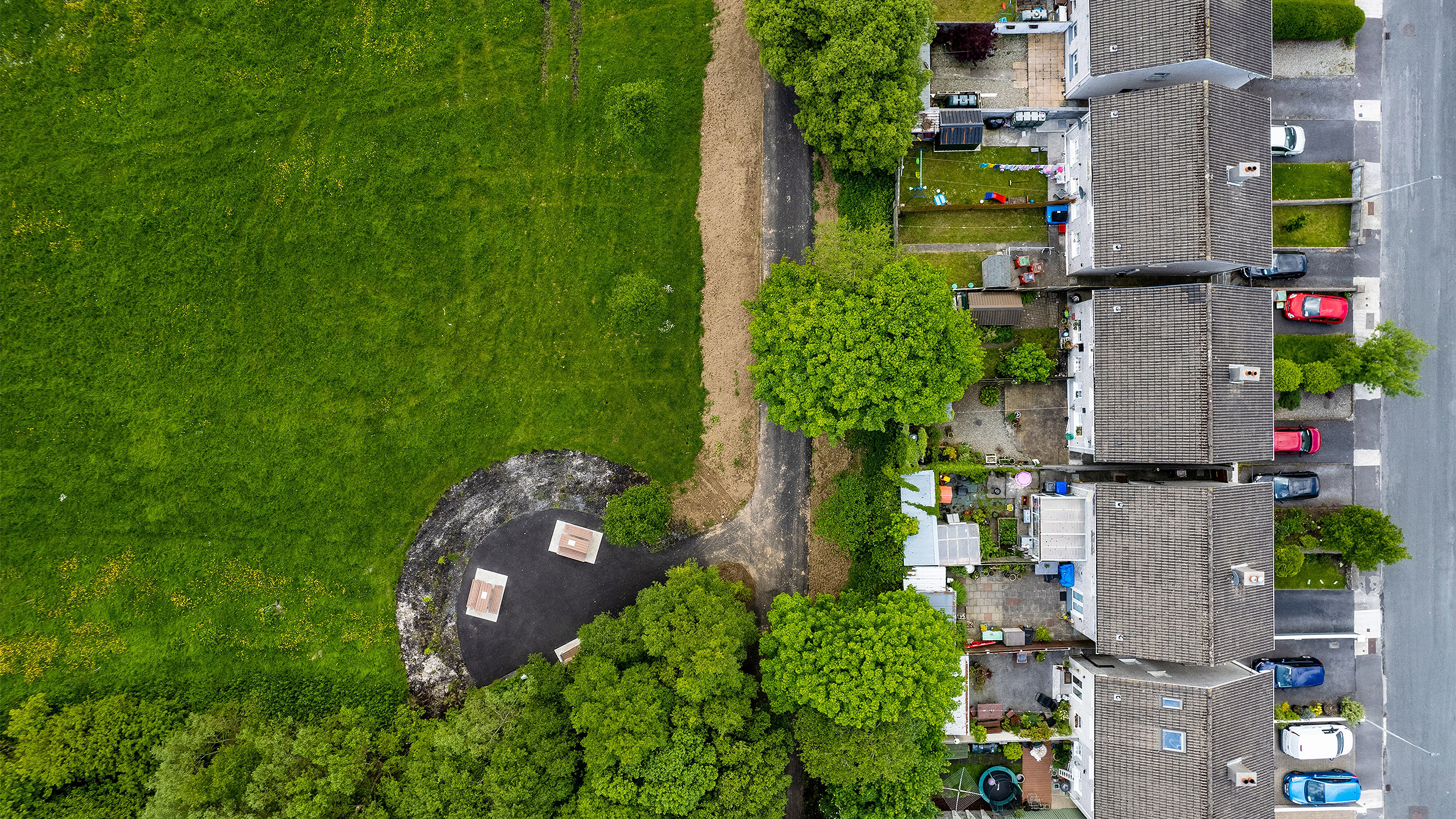 High density living area with houses close to each other near a park